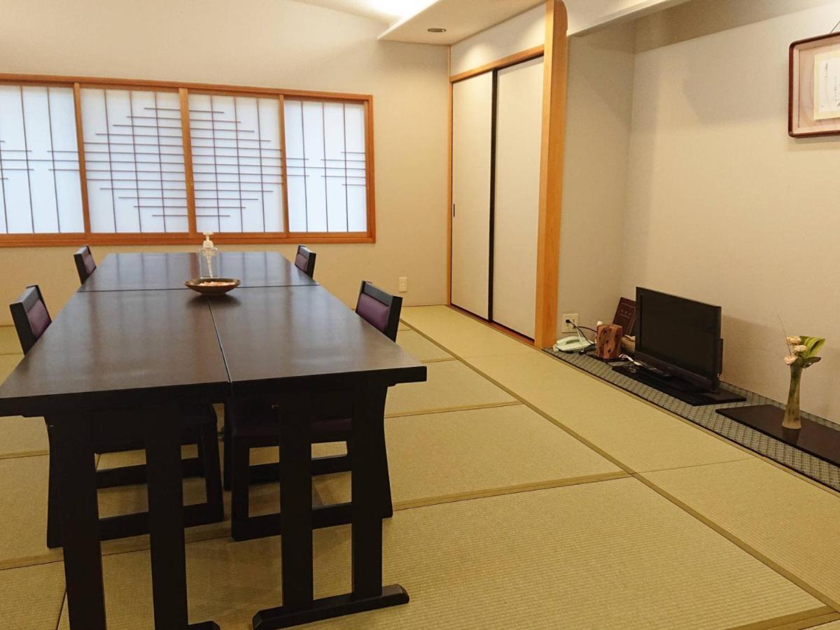 Kagetsu Ryokan Maizuru Quarto foto
